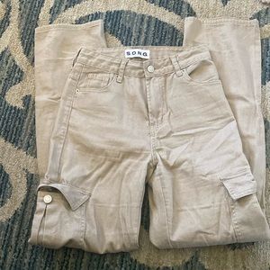 Beige cargo pants side pockets on each leg